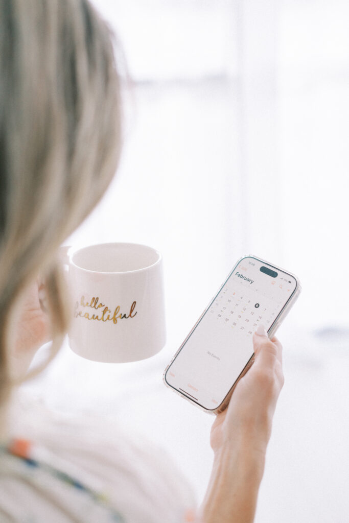 Image of a phone's calendar with coffee mug.